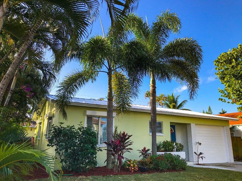 Front of house with metal roof installed 2018