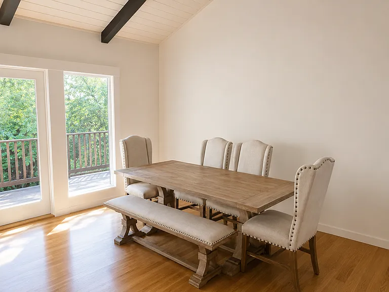 Dining Area with french doors that lead to the upper deck