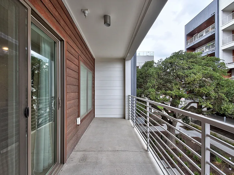 Oversized balcony overlooking the inner plaza