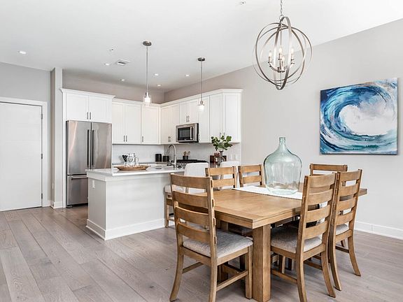 Residence Features Hardwood Flooring Throughout, Quartz Counters and Name-Brand Appliances