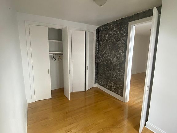 Bedroom with build-in closets