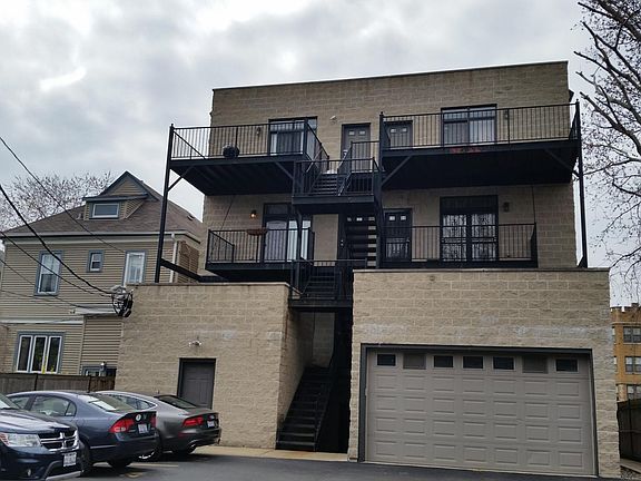 Back of building, parking space