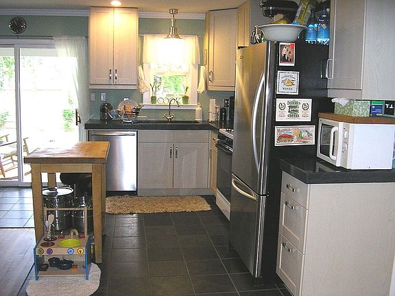 Kitchen with Custom Concrete Counter tops 