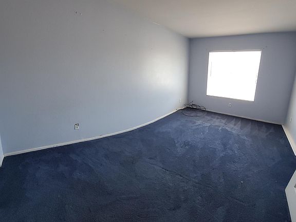 Downstairs Front Bedroom/Office/Den (Curved Due to Panoramic Shot)