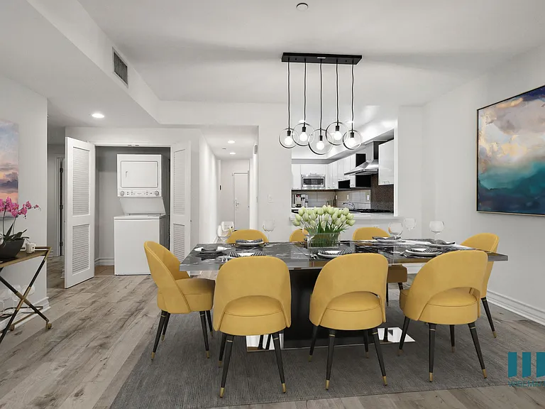 Open-Concept Kitchen and Dining Space with In-Suite Washer & Dryer