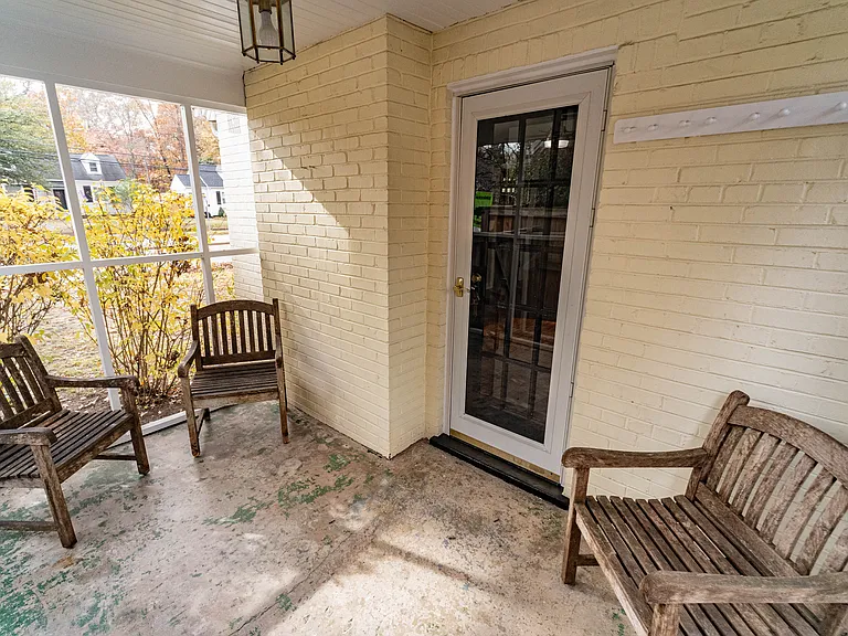 Screened-in side porch.