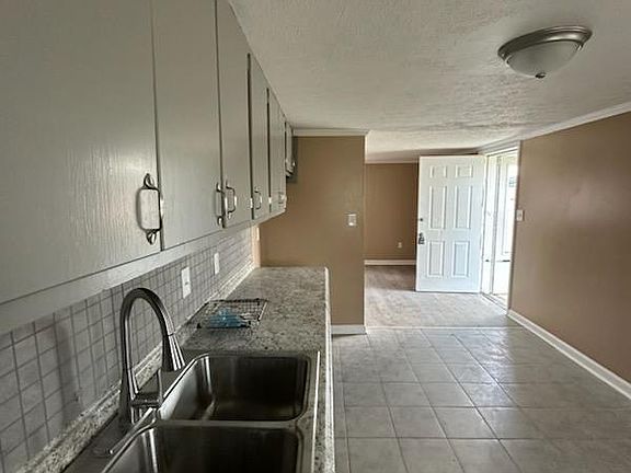 Spacious Kitchen with Ample Cooking & Counter Space