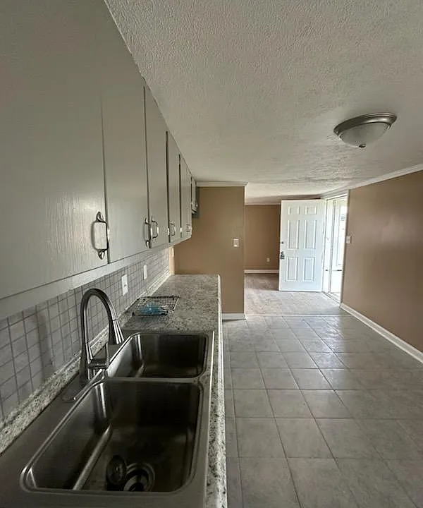 Spacious Kitchen with Ample Cooking & Counter Space