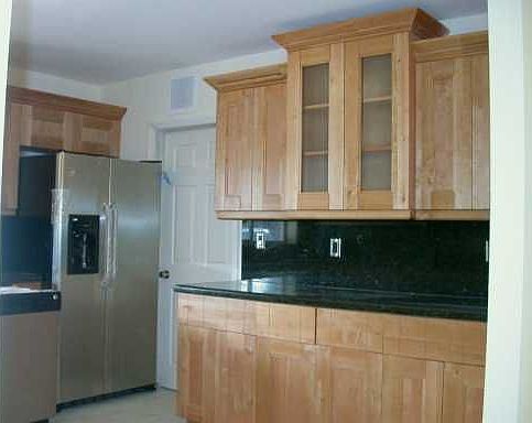 New wood and granite kitchen