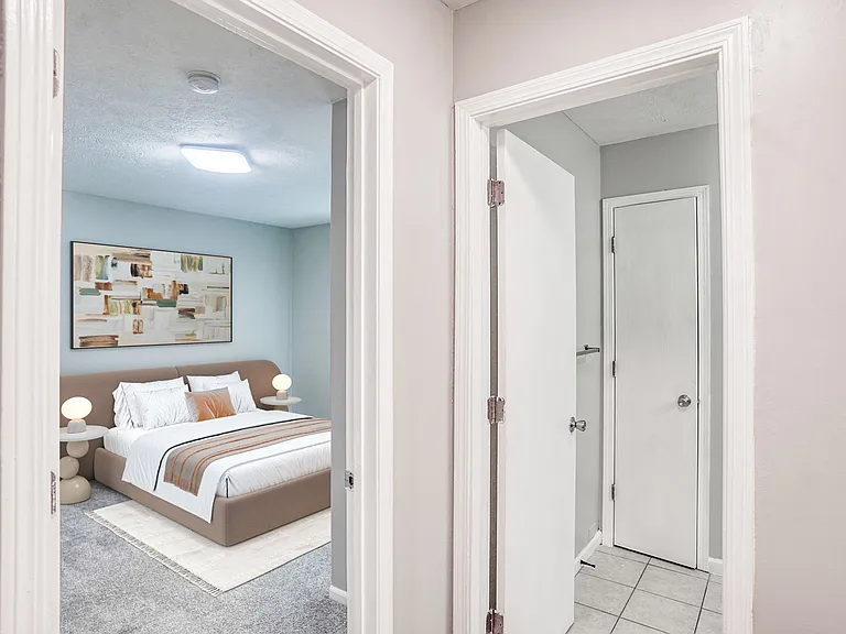 Step into the elegance of McCarty Place Apartments with this spacious bedroom featuring modern finishes and inviting natural light. The thoughtful layout maximizes comfort and style. Explore your new home today!