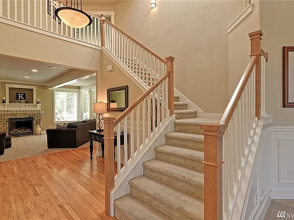 From front of home just outside the formal living room and office, the family room is straight ahead. Notice the beautiful hardwood floors. They are like new. Shoes were never allowed in the home.