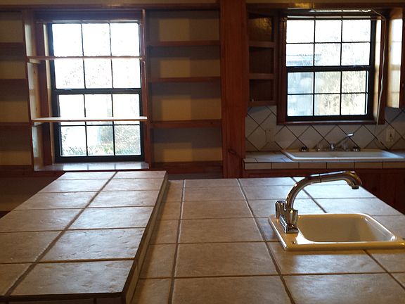 bar looking at book shelves