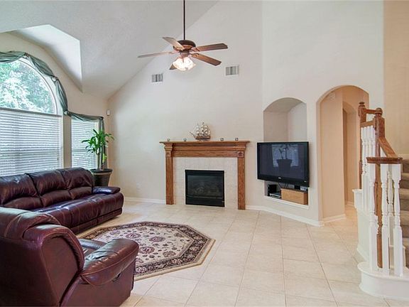 Cozy fireplace is perfect for curling up next to with a good book