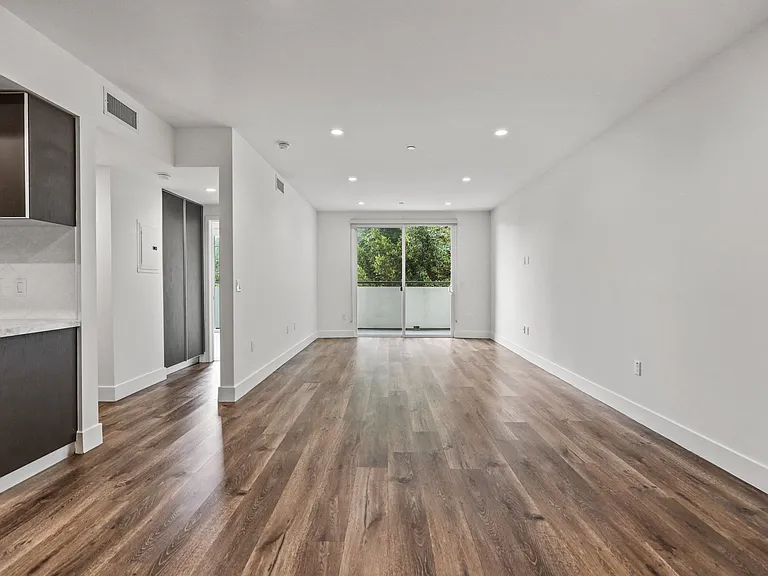 Open-Concept Kitchen, Dining, and Living Room Spaces