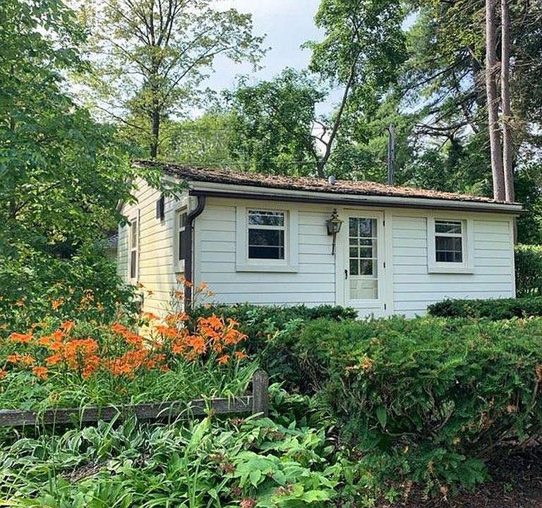 Studio cottage faces the Milwaukee River.