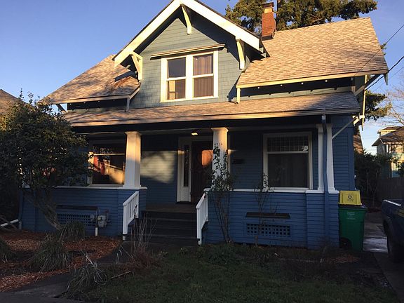 Full front porch, off street parking in driveway alone side of home.