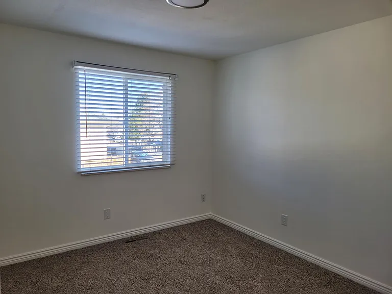 One of two secondary bedrooms