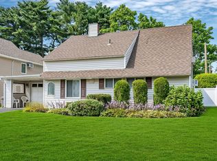 8 Pinecone Ln, Westbury, NY 11590
