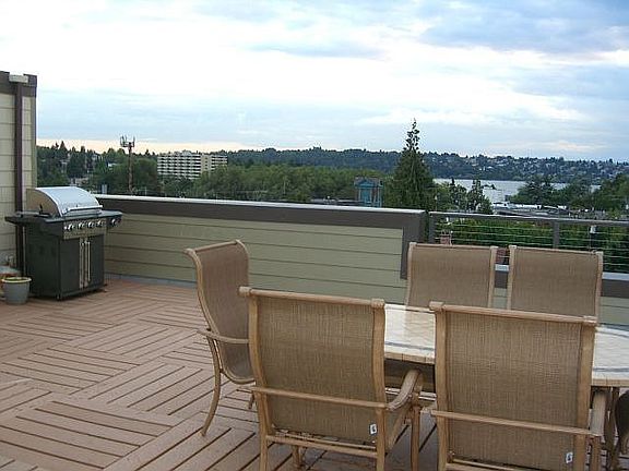 new roof top deck with grill and views