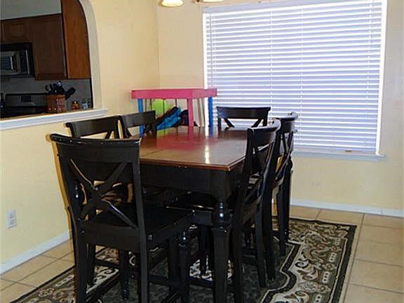 Enjoy family dinners in your very own dining space.  Notice the open window into the kitchen for easy food passing to the table and flowing conversation with the chef.