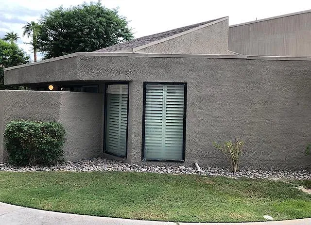 Exterior photo of Dining Room windows floor to ceilings!