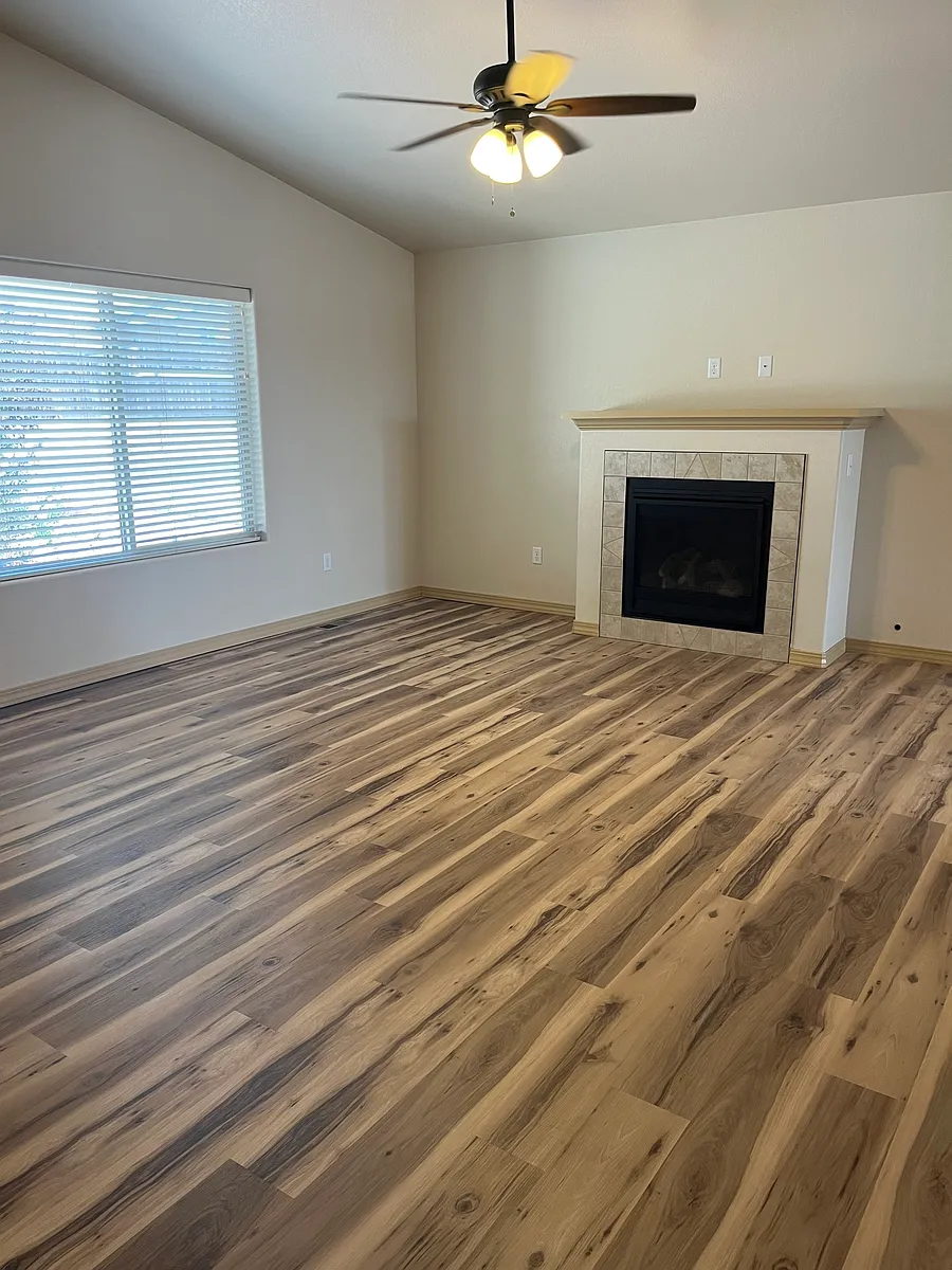 Living room with gas fireplace - 4419 Erindale Ln