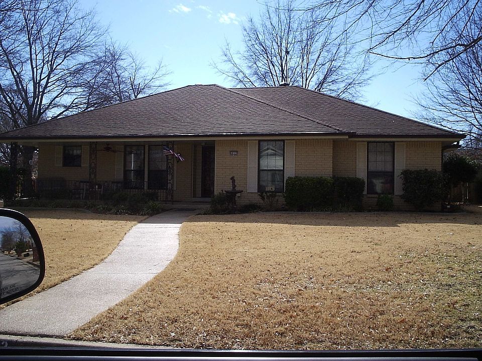 New Orleans inspired front porch complete with ceiling fan