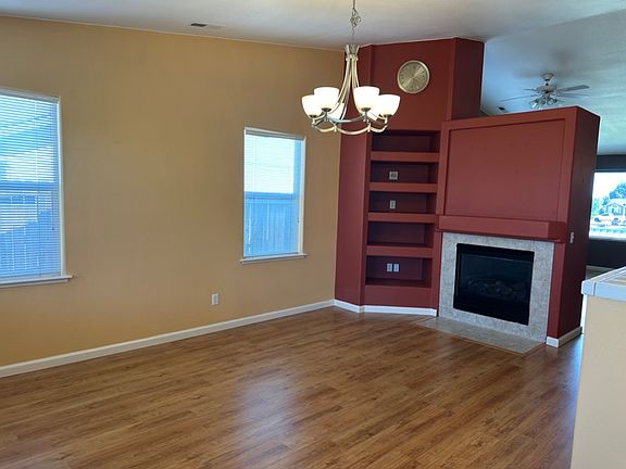 Family Rm / Dining Rm with Fireplace - View #2