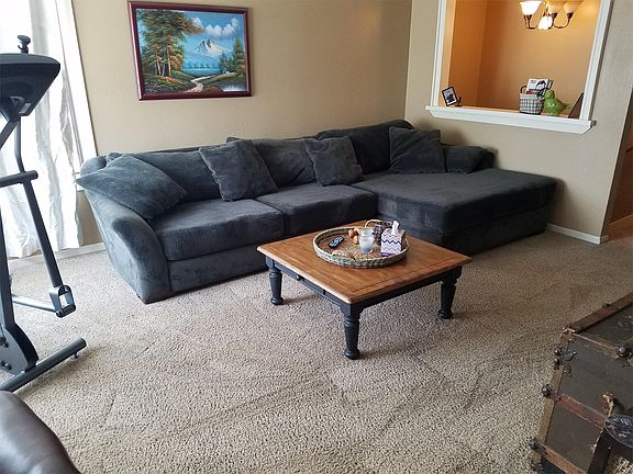 Couch is 11 ft long - unit is unfurnished - picture with fur