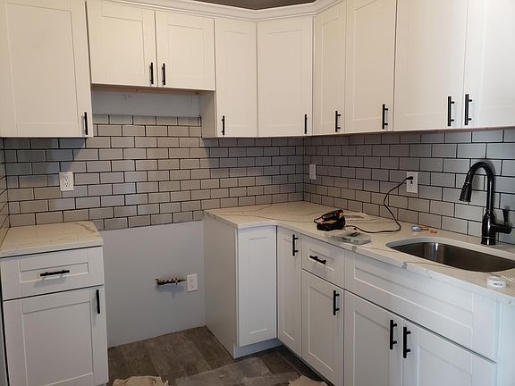 Beautifully Renovated Modern Kitchen with New Appliances Being Installed In A Few days