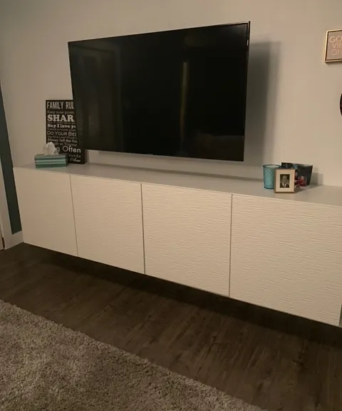 Storage cabinet under the TV in the rec room.