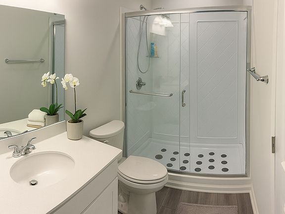 1st Floor bathroom with linen closet.