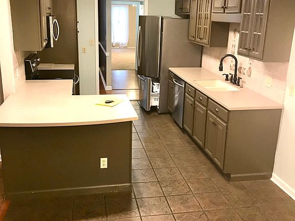 View of kitchen from breakfast area