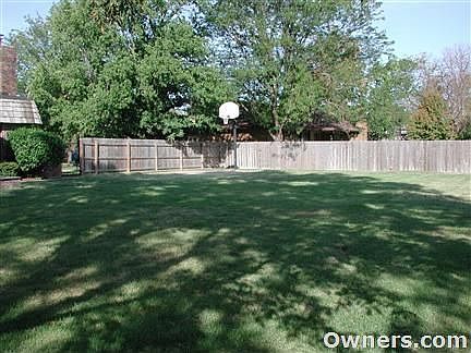 Fenced Backyard, B-Ball court