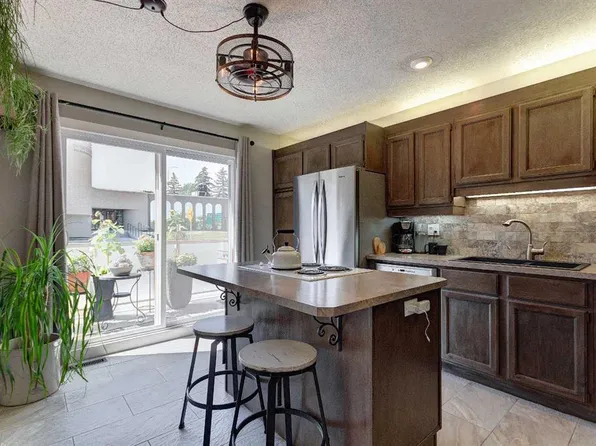 1305 W Glenmore Trl SW #103, Calgary, AB T2V 4Y8