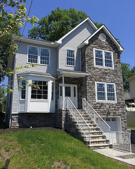Front Stone & Vinyl Siding