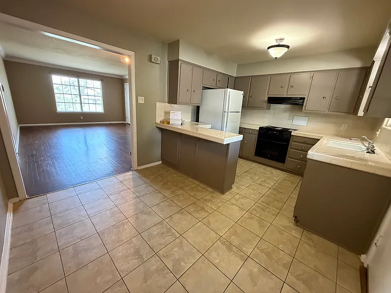 Kitchen includes area for a table