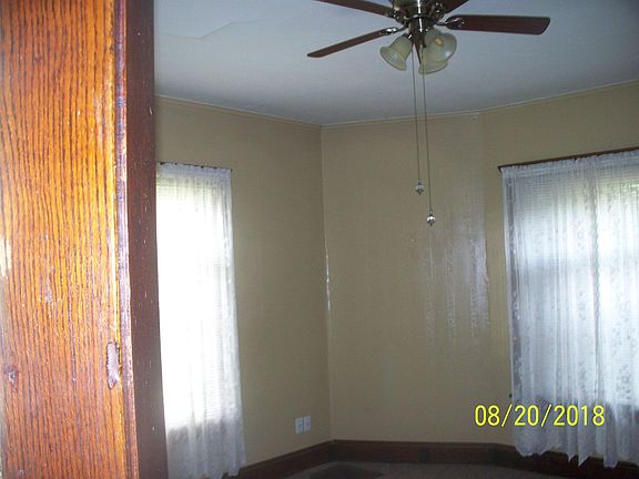 Living Room from entrance, 3 large windows