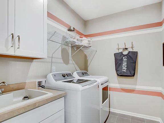 Laundry room with cabinet space