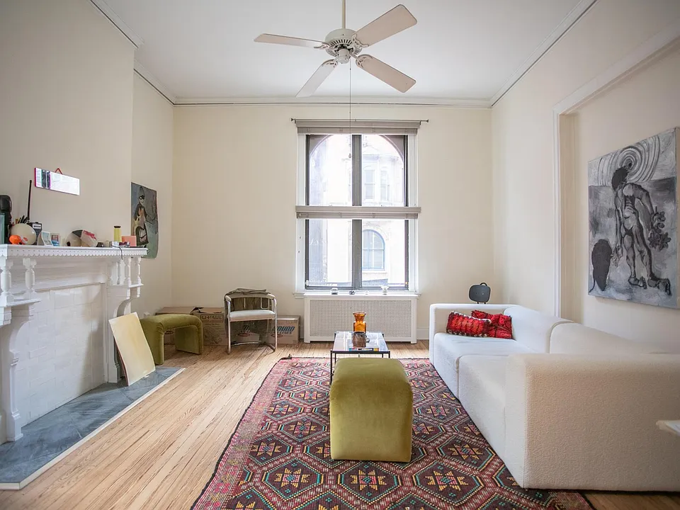 Living room, Arched window to Locust St. Fireplace mantle