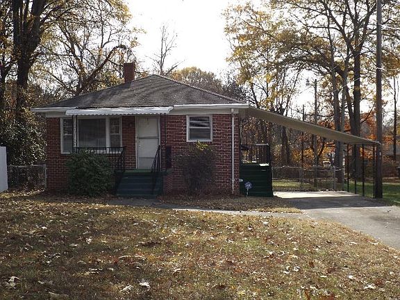 Covered carport on the right