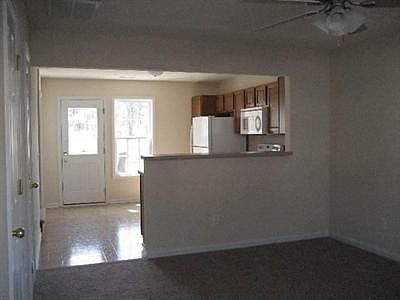 kitchen opens to living area