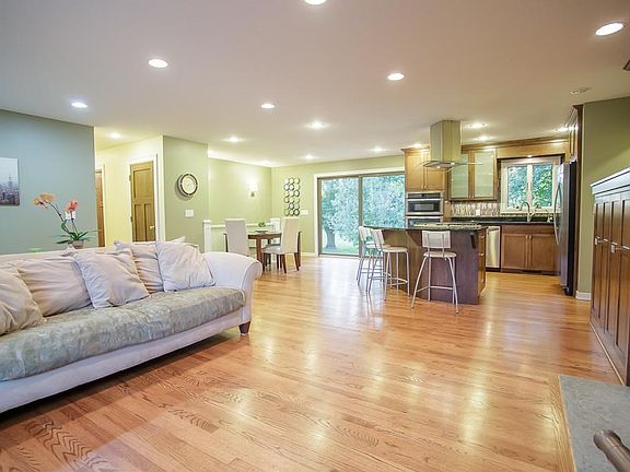 Open floor plan with oak flooring throughout.