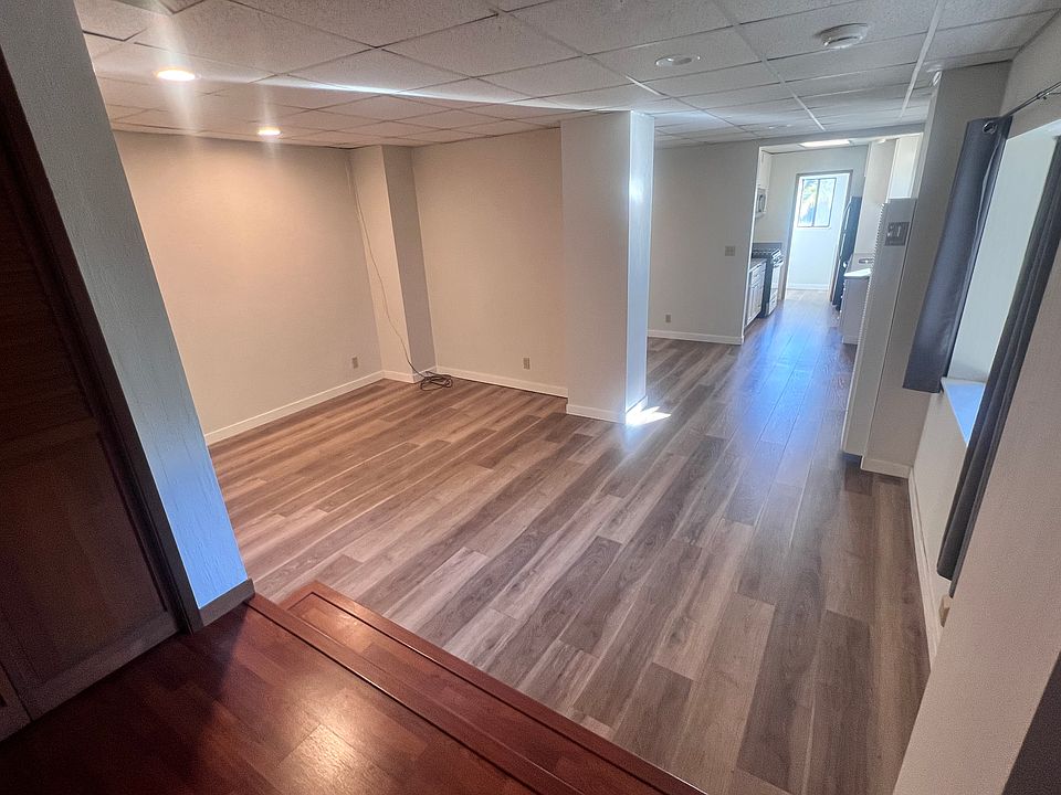 Living room where couch and TV go (18' x 12')