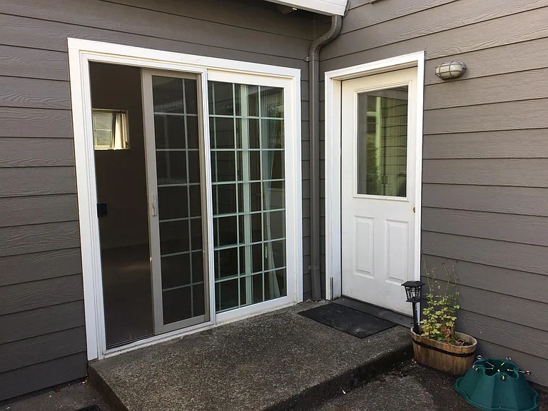 Courtyard entrance and master bedroom sliding door