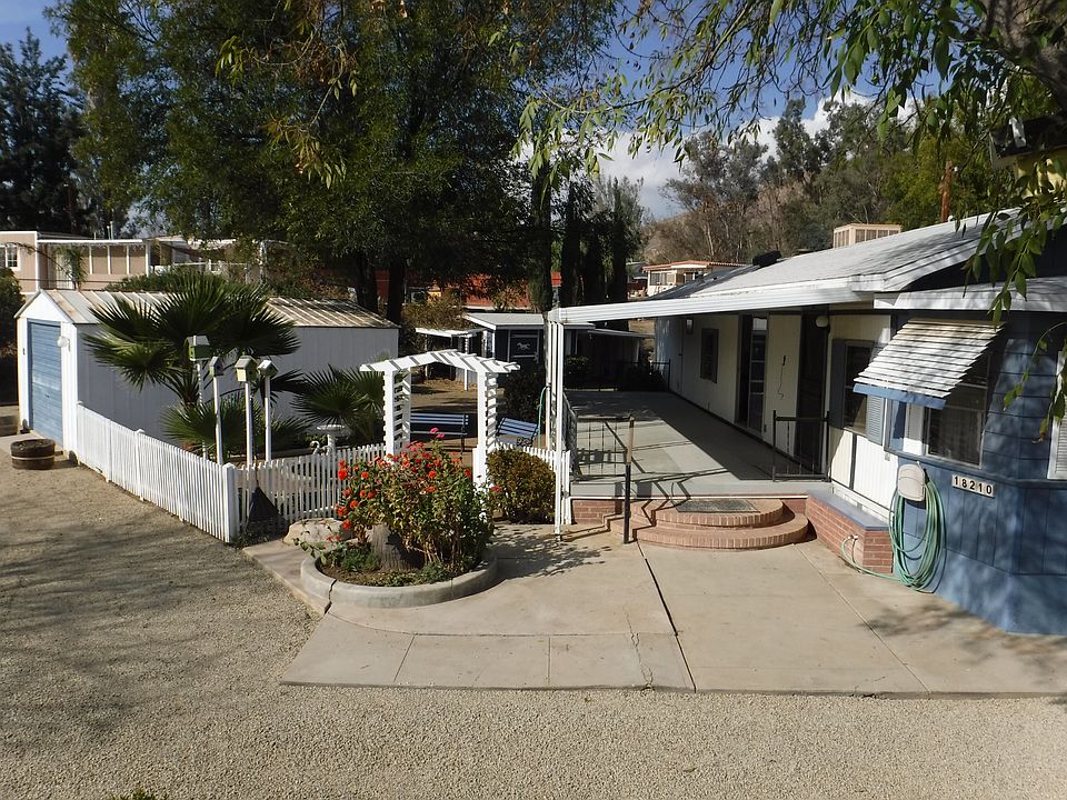 Front Porch and fenced Garden