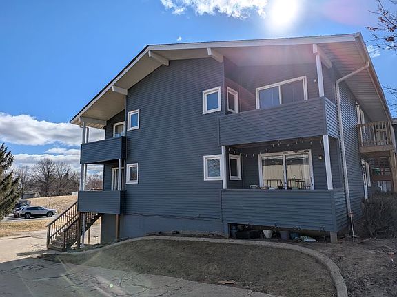 Side of building, decks for 1A, 1B, 2A, 2B.