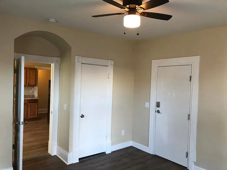 Bedroom 1 with closet and second entry door