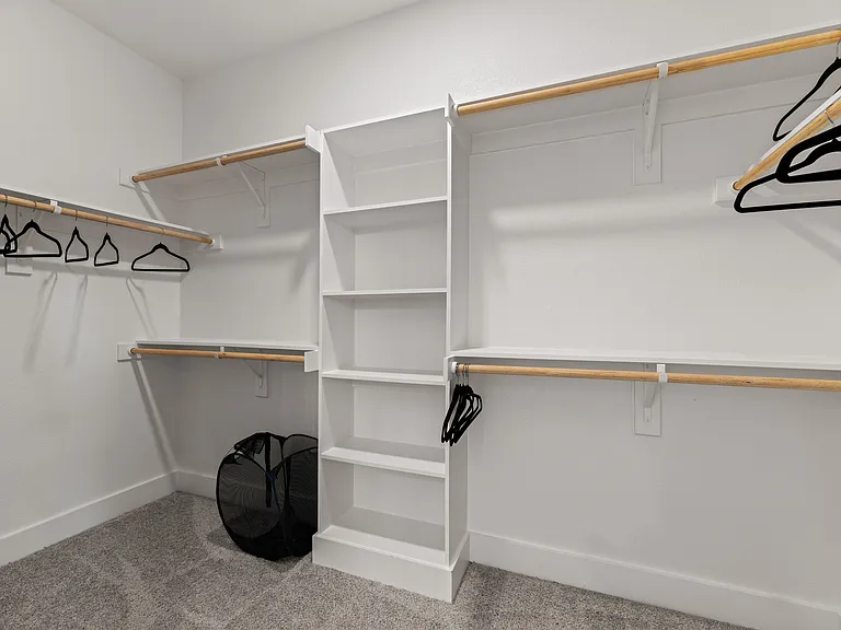 The Master Closet offers plenty of room to hang your clothes.