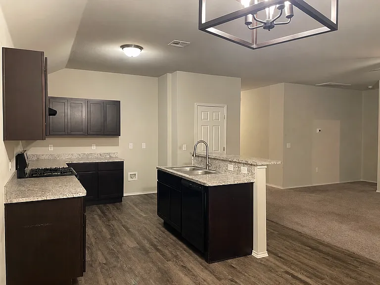 kitchen also includes a spacious pantry
